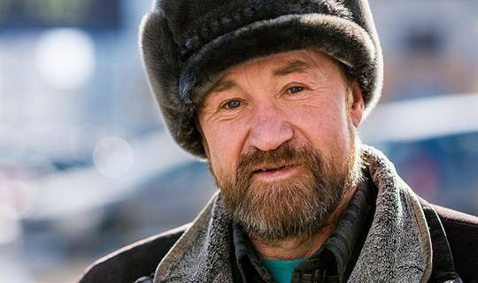 Russian Man looks into the Camera in Siberia